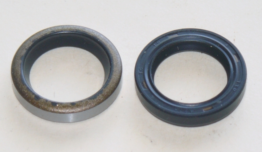 The seal on the left is the metal-cased one to use. The rubber-cased one on the right just pops straight out!